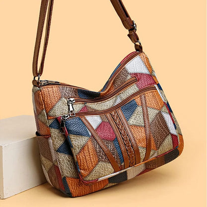 Montiel | Bolso de mano de piel mosaico premium